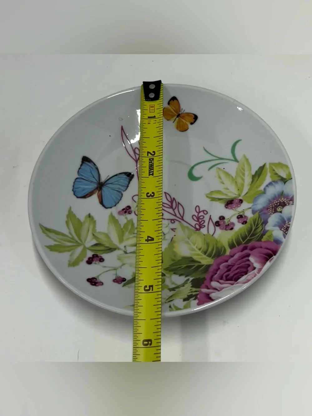 Ceramic teacup and saucer